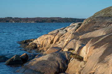 Fototapeta na wymiar Soft rock surface in Sillvik in Gothenburg in Sweden in winter