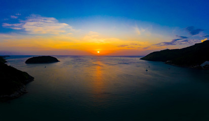 aerial view sunset above Nai Harn beach. Nai Harn beach is a famouse landmark and popular sunset viewpoint of Phuket Thailand