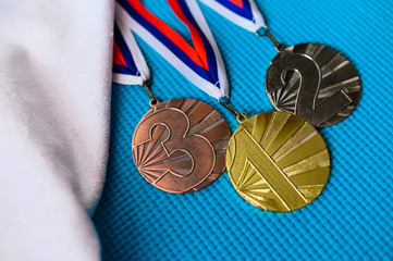 Medal podium, sport photo, gold silver and bronze medal, sport photo. Original wallpaper for summer...