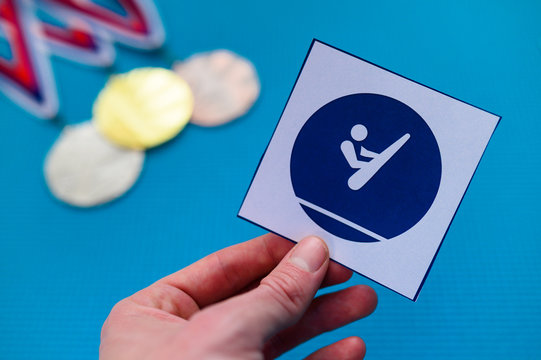 Trampoline Gymnastics icon and medal set, gold silver and bronze medal, blue background. Original wallpaper for summer olympic game in Tokyo 2020