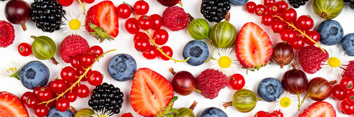 Strawberry, blueberry, blackberry, gooseberries, raspberry, currants on white background, top view. Berries texture. Pattern of fresh summer berries on white background. Creative food concept