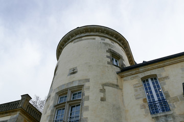 Closeup architectural details of ancient historic castle or chateau in France - round tower forms