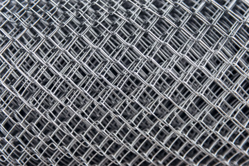 fragment of the fence netting in the roll