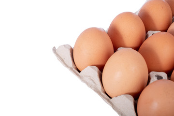 Fresh brown chicken eggs on panel