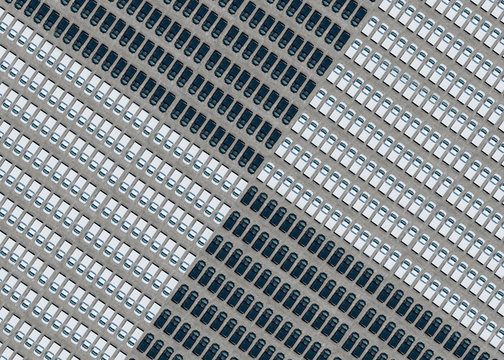 Aerial view of large number of black and white cars arranged in parking lot