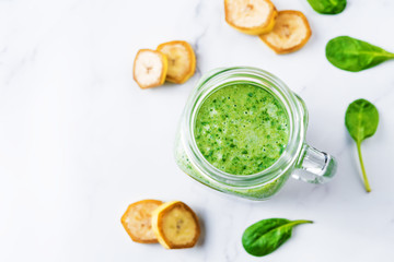 Spinach banana smoothies in glass