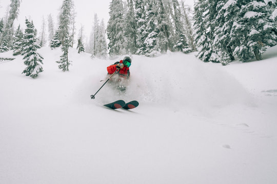 Skier making turns in powder in Colorado