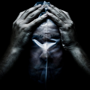 Man with a plastic bag on his face