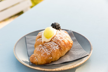 Creamy croissant with berries