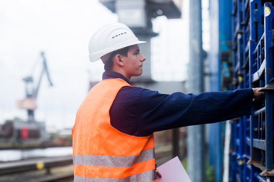 worker young male controlling shelf