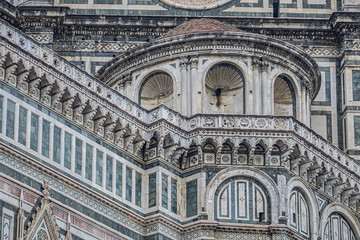 Architectural fragments of Cathedral Santa Maria del Fiore (or Duomo di Firenze), located in Piazza del Duomo, was built between 1296 and 1436. Cathedral is one of largest in world. Florence, Italy.