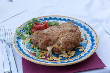 Cutlet with arugula