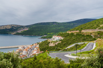 Cloudy view of Lustica bay, Montenegro.