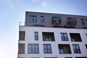 Modern and new apartment building. Multistoried, modern, new and stylish living block of flats.