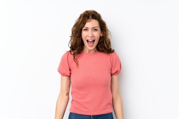 Fototapeta premium Young pretty woman over isolated background with surprise facial expression