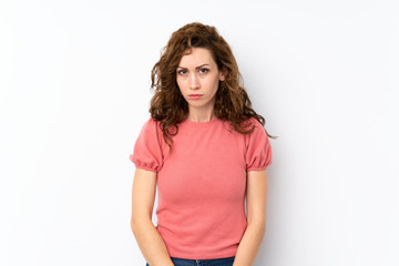 Fototapeta premium Young pretty woman over isolated background with sad and depressed expression