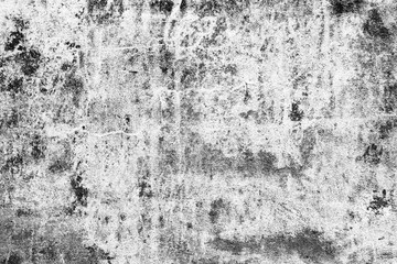 Fototapeta premium Texture of a concrete wall with cracks and scratches which can be used as a background