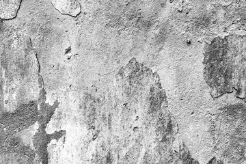 Texture of a concrete wall with cracks and scratches which can be used as a background