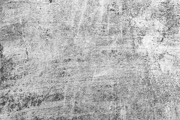 Texture of a concrete wall with cracks and scratches which can be used as a background