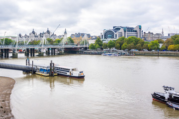 Charing Cross station, Hungerford Bridge, river Thames, Festival Pier, day time. London, UK.