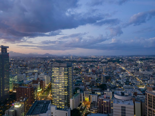 Fototapeta na wymiar Sunset aerial view of the Sendai cityscape