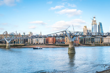 daytime london famous millennium footbridge people walking. London, UK