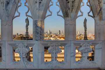 Fototapeta premium Skyline of Milan with the modern skyscrapers of Porta Nuova, seen from the top of the Cathedral, Italy