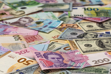 Closeup of dollar, euro and hryvnia banknotes 