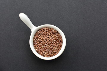  Natural sesame seeds on wooden background