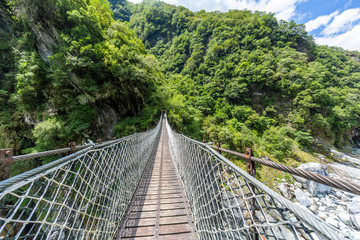 Panoramic view over suspension bridge in the Taroko national park on Taiwan in summer