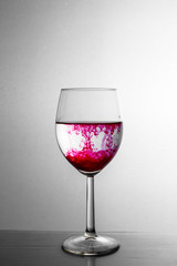 ink in a glass of water