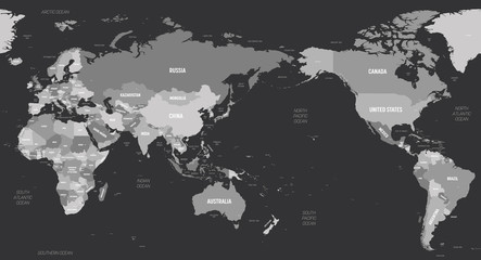 World map - Asia, Australia and Pacific Ocean centered. Grey colored on dark background. High detailed political map of World with country, capital, ocean and sea names labeling