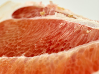 Fresh and juicy pomelo and its slices.Isolate on a white background