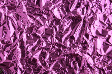 Fototapeta premium Abstract trendy purple colored crumpled foil texture background. 2020 year color trend concept.