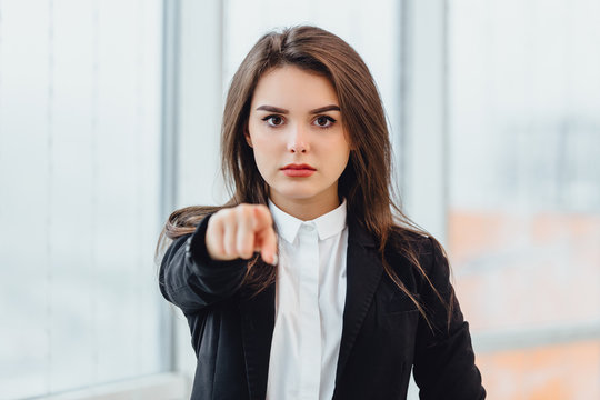 Closeup Portrait Of Young Serious Woman Pointing At Someone As If To Say You Did Something Wrong, Your Fault. Negative Human Emotions Concept.