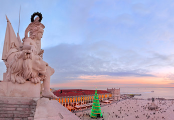 Lisbon, Portugal, a sunset view of the Praca do Commercio (Commerce Square) from the Rua Augusta...