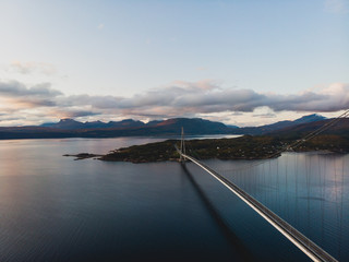 Aerial view of a Halogaland suspension bridge which crosses the Rombaksfjorden in Narvik Municipality in Nordland county, Norway, part of the European Route E6 highway