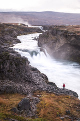 Woman in front of Detifoss in iceland