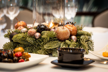 Obraz na płótnie Canvas Table for Christmas dinner with decoration