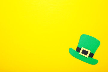 St Patrick's Day Leprechaun hat on yellow background.