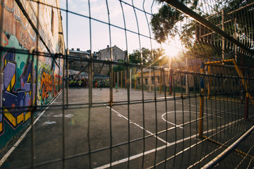 ODESSA, UKRAINE. Children playing soccer at sunset