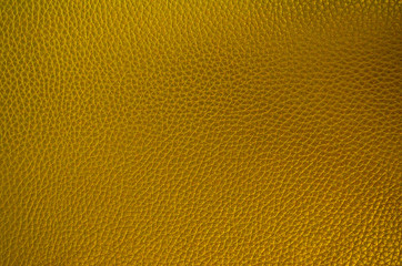 Leather texture. Golden fashionable background. Stylish wallpaper