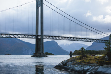 Classic Norwegian cold panoramic landscape of Efjorden fjord, Ballangen municipality, Nordland county, Ofoten district, Norway with Efjord Bridges, Stortinden mountain, Northern Norway