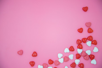 Heart shape candy on pink background. Valentines day concept. 