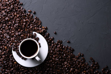 Coffee cup and beans on old grey kitchen beton , rock table. Top view with copyspace for your text