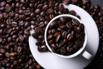 Coffee cup and beans on old grey kitchen beton , rock table. Top view with copyspace for your text
