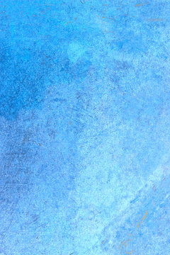 Vertical image of a blue concrete wall. Abstract blue wall texture background, copy space for text.