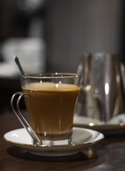  Coffee with spoon in a bar
