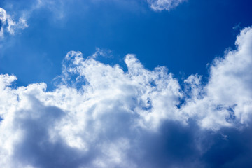 White clouds in a blue sky