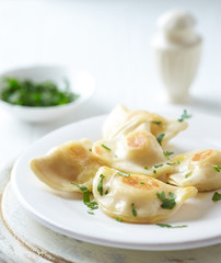 Dumplings with potato and cottage cheese stuffing (pierogi). Traditional Polish Christmas Dinner....